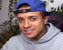 He has piercing on his nose and ears.